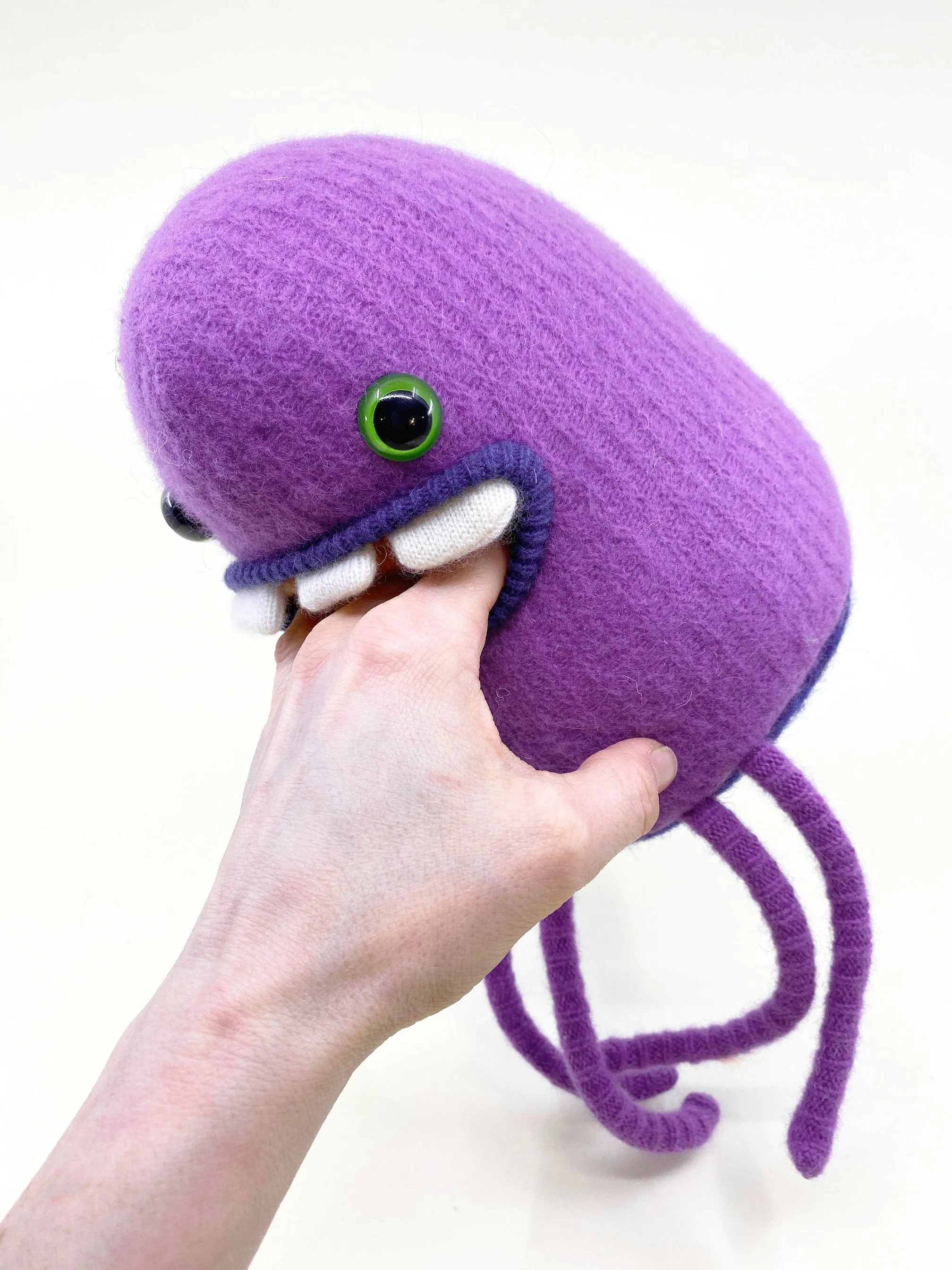 Allan the purple plush friendly monster