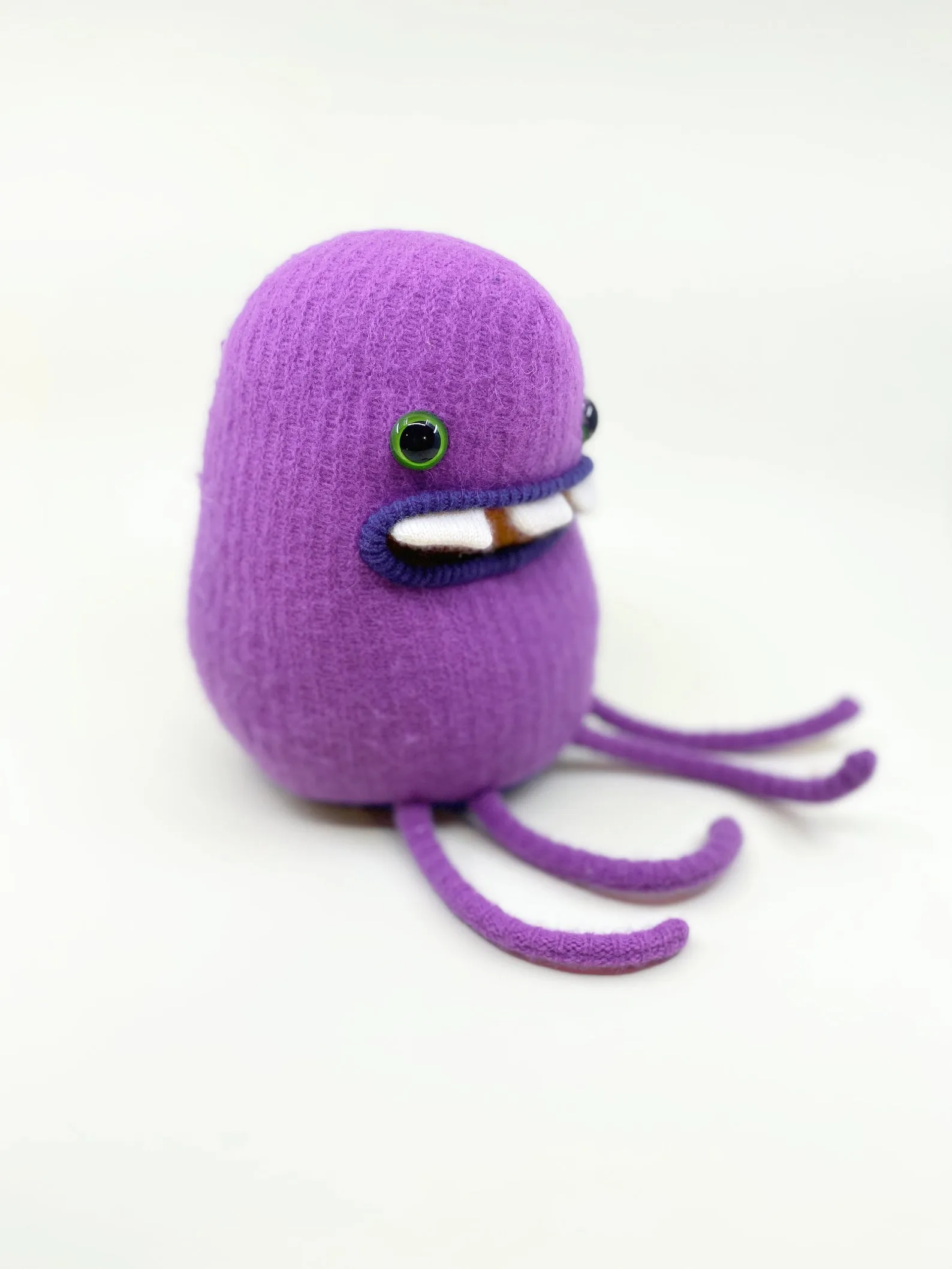 Allan the purple plush friendly monster