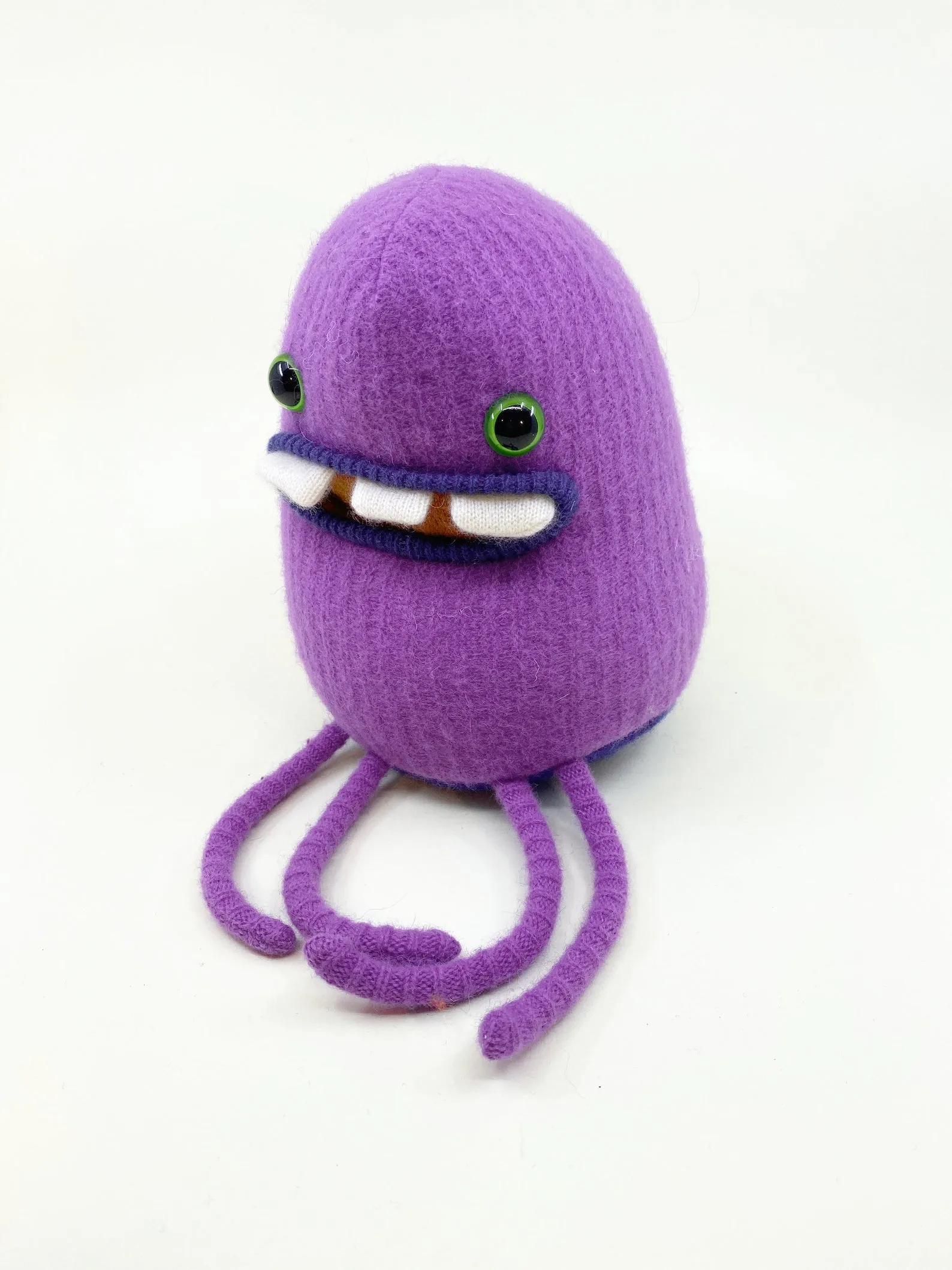 Allan the purple plush friendly monster
