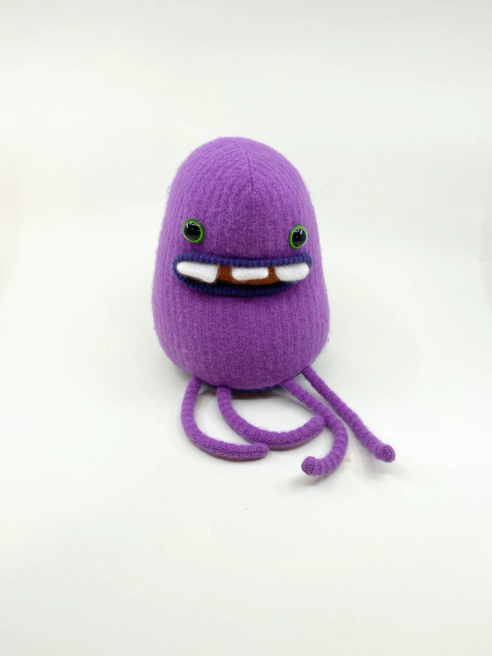Allan the purple plush friendly monster